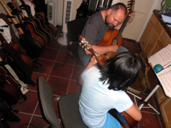 One-on-one guitart lesson.